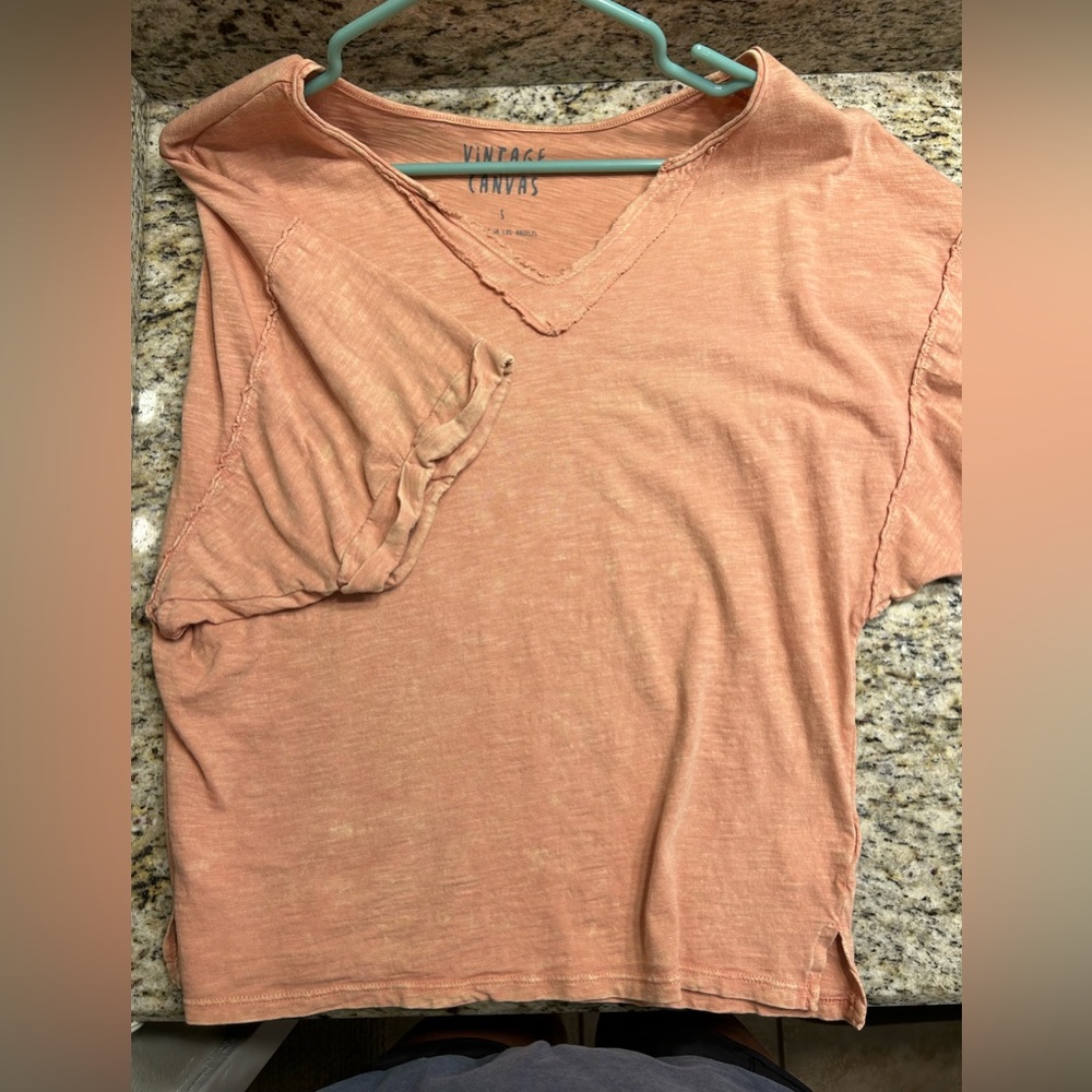 super cute weathered looking peach colored tee